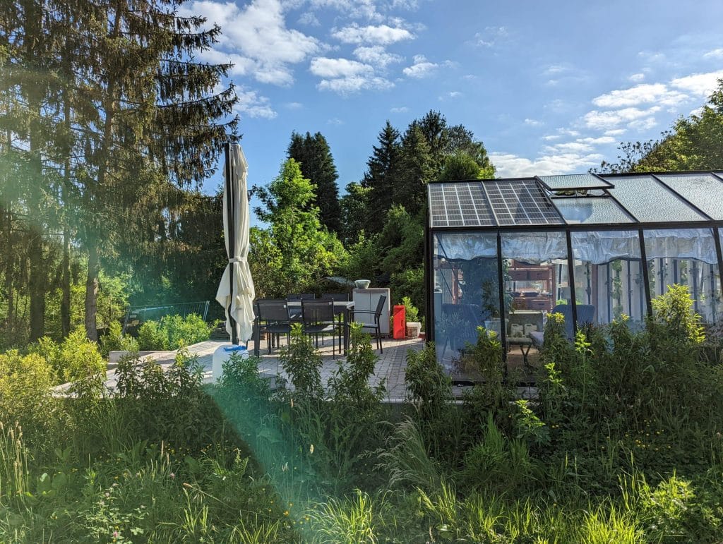 Serre dans un jardin Allemand en bord de terrasse