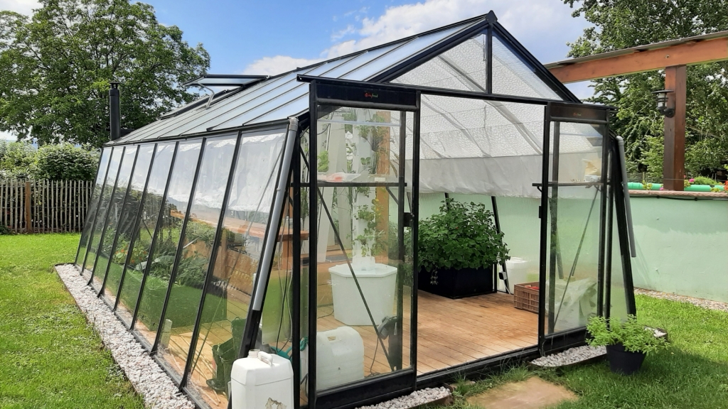 A Family greenhouse in a pioneer's garden